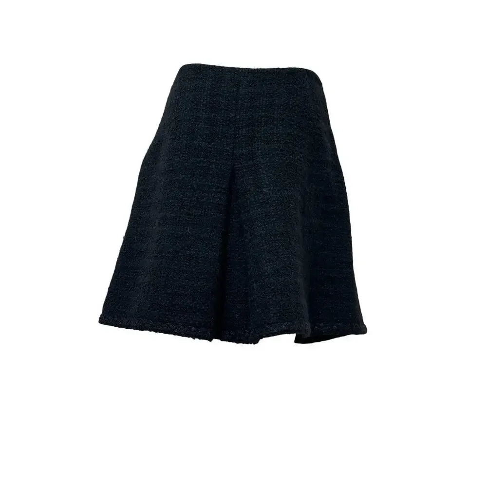 CHANEL Black Bouclé Wool A-Line Skirt with CC Button - FR 48